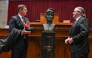 Julie Smith/News Tribune
Missouri Speaker of the House Dean Plocher hosted a brief ceremony in the House chamber Monday to unveil the bust of Marie Watkins Oliver, who is hailed as the "Betsy Ross of Missouri." Oliver played a key role in designing and crafting the Missouri State Flag. Her great-great grandson Jack Oliver, shown at right.